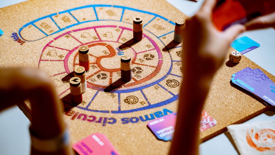 Players rolling dice to determine turn order in a board game