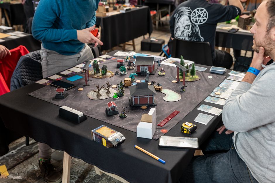 Players deep into a long board game session