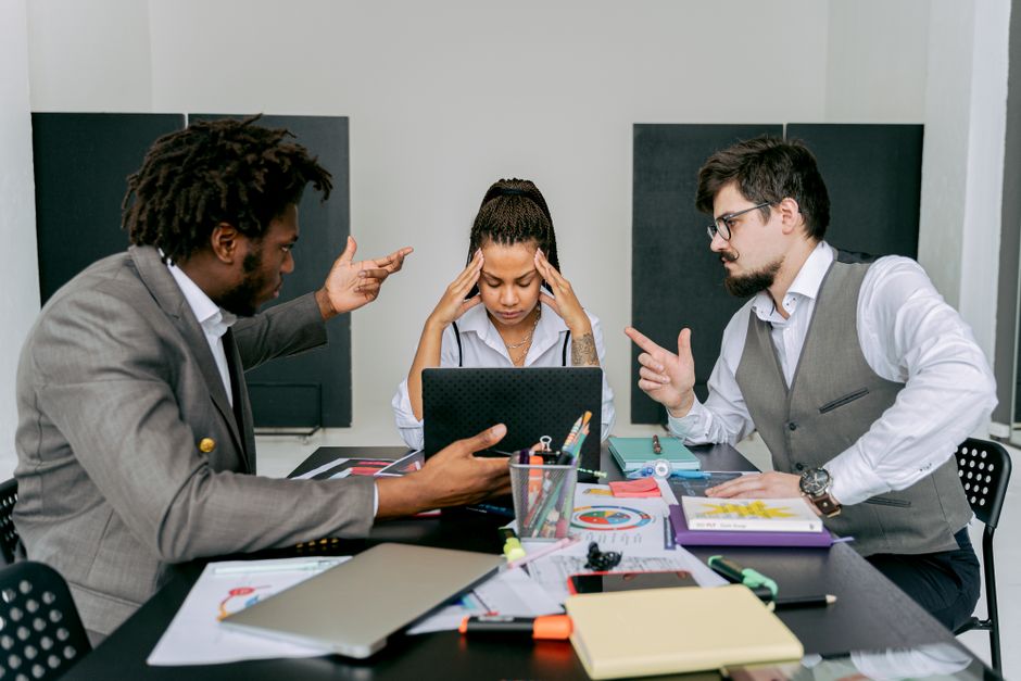 Players discussing a disputed rule during a board game